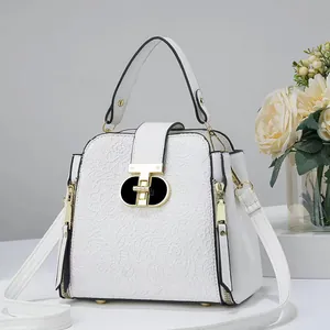 Sac seau blanc élégant avec relief en dentelle florale et boucle en H dorée