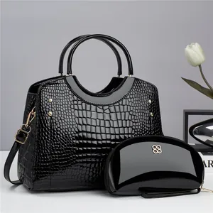 Ensemble sac à main noir brillant à motif crocodile avec rivets dorés chic