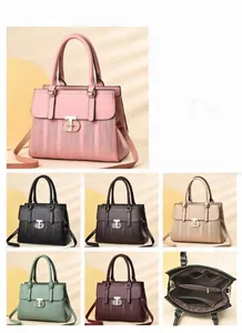 Detailed view of striped handbag dimensions and interior multi-compartment structure