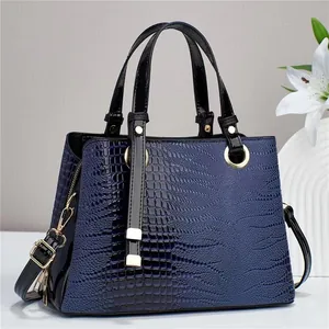 Chic gradient crocodile embossed handbag with gold hardware and detachable strap