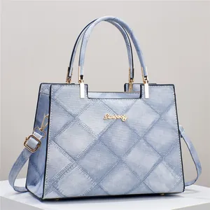 Large capacity vintage blue denim tote bag with quilted texture and gold hardware