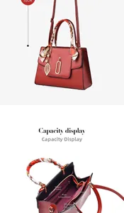 Detail view of red PU leather bag interior compartments and decorative scarf handle