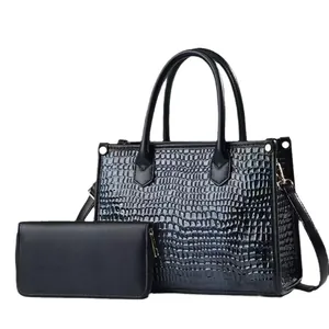 Elegant black crocodile embossed tote bag and matching wallet set for women