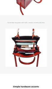 Detail view of large capacity multi-compartment interior and metal hardware of the handbag