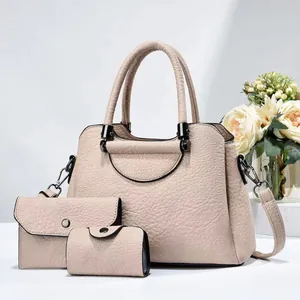 Detailed 3-piece set featuring handbag, wallet, and purse in beige litchi leather