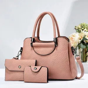 Pink minimalist 3-piece handbag set featuring a tote, wallet and card holder