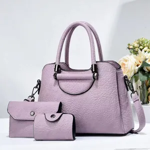 Three-piece set of light purple textured leather handbags with detachable shoulder strap