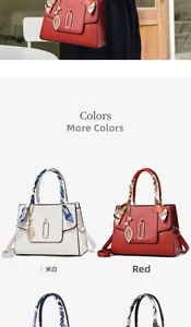 Detail of lychee pattern faux leather handbag with silk scarf handle and metal leaf charm
