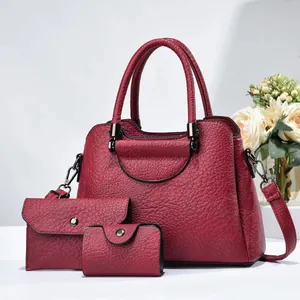 Red 3-in-1 women's handbag set with tote, envelope clutch and coin purse in lychee pattern