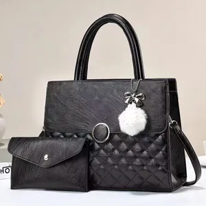 Quilted black faux leather handbag and envelope clutch set with round metal lock