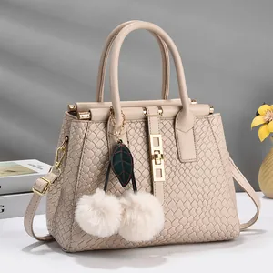 Elegant beige embossed woven texture handbag with plush cherry charms and gold hardware