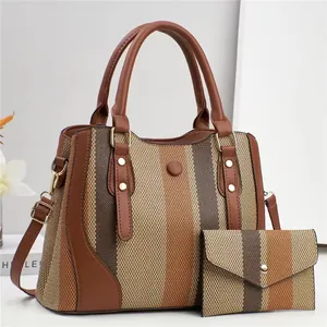 Sac fourre-tout en toile à rayures avec pochette assortie et poignées en cuir marron