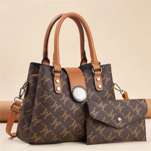 Brown monogram tote bag set with matching pouch and stylish leather straps