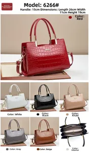 Detailed view of crocodile embossed patent leather tote bag dimensions and structure