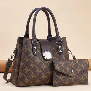 Brown monogram tote bag set with matching wallet and silver round buckle hardware