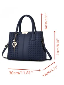 Diagramme de taille détaillé du sac bleu marine montrant les dimensions 30x21x13cm et texture