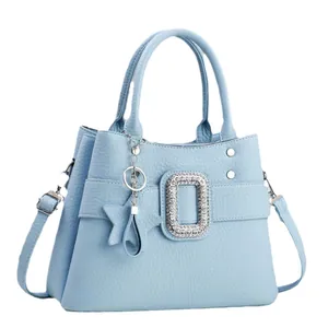 Light blue faux leather handbag with lychee texture and silver rhinestone buckle decor