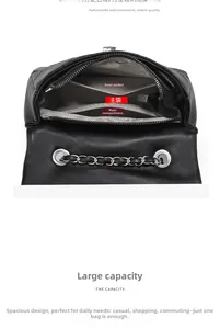 Detail view showing internal compartments of the black quilted leather chain bag