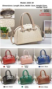 Detail view of crocodile pattern handbag showing 29x13x22cm dimensions and color range