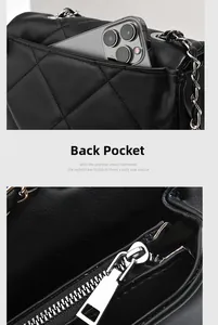 Detail of black quilted shoulder bag featuring back slip pocket for smartphone storage