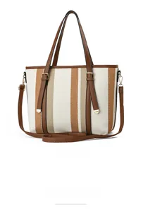 Macro detail of large stripe tote bag with back structure and adjustable strap