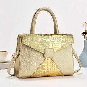 Sac à main doré en similicuir embossé avec poignée supérieure et bandoulière amovible