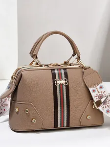 Sac docteur en cuir marron avec rayures rouge-vert et bandoulière fleurie