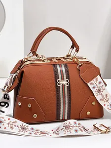 Sac docteur en cuir marron avec rayures rouge-vert et bandoulière jacquard florale