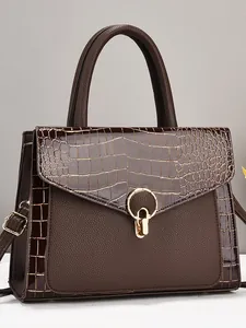 Dark brown faux crocodile embossed tote bag with gold buckle and top handle for women