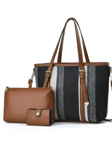 Three-piece striped canvas tote bag set with brown leather handles and matching pouches