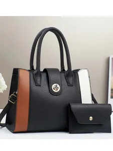 Chic tricolor patchwork tote bag with gold clover lock and matching small wallet
