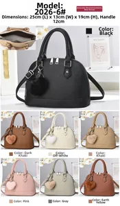 Detailed view of leather shell bag showing double zippers, fuzzy charm, and 7 color options