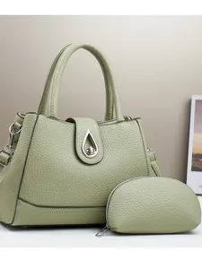 Elegant light green lychee texture tote bag with metal lock and matching coin purse
