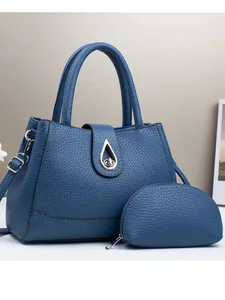 Elegant blue lychee texture handbag set with silver hardware and matching coin purse