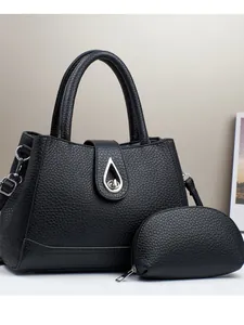 Litchi pattern leather shoulder bag and small purse set with silver twist lock