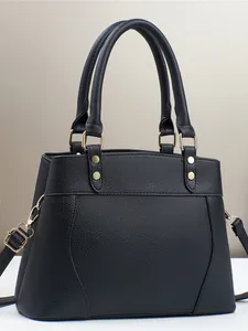 Classic black pebbled leather tote bag with gold hardware and top handles for women