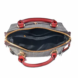 Overhead view showing the three spacious inner compartments and gold zipper of the tote