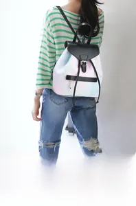 Detail of gradient pattern backpack with black leather flap and silver buckle closure