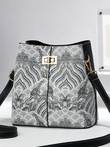 Elegant bucket bag with Chinese embroidery and wave patterns with leather strap