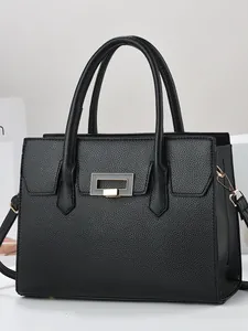 Classic black lychee pattern leather tote bag with gold hardware and dual handles