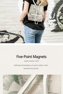 Detail of floral bucket bag with magnetic silver hardware and high-quality stitching