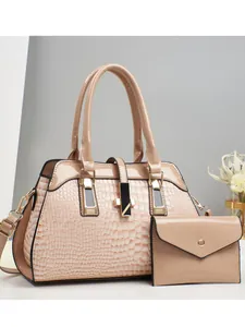 Beige embossed patent leather tote bag set with matching clutch and gold hardware