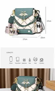 Detail view of contrast crossbody bag capacity with smartphone and accessories