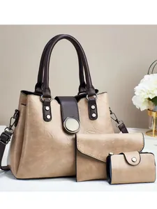 Three-piece beige PU leather handbag set with tote, envelope clutch and coin purse