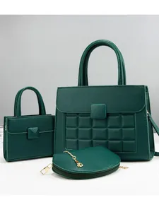 Three-piece dark green handbag set featuring quilted faux leather and gold chain details
