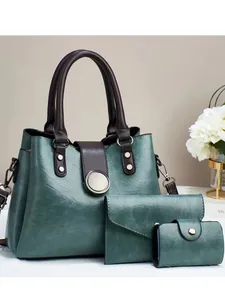 Three-piece retro green handbag set including shoulder bag, pouch and card holder