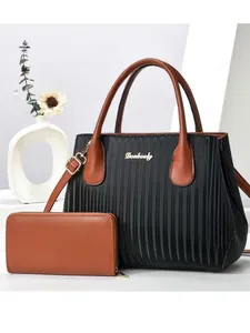 Fashionable black pleated tote bag with brown leather handles and matching wallet set