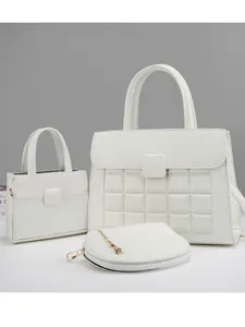 Three-piece set of white faux leather handbags with embossed pattern and gold hardware