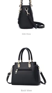 Side and back view of a black pebble leather tote bag with elegant gold hardware