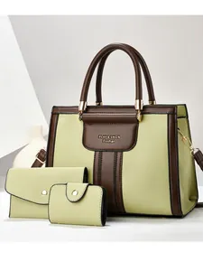 Ensemble de trois sacs à main vert citron et marron contrastés en similicuir grainé